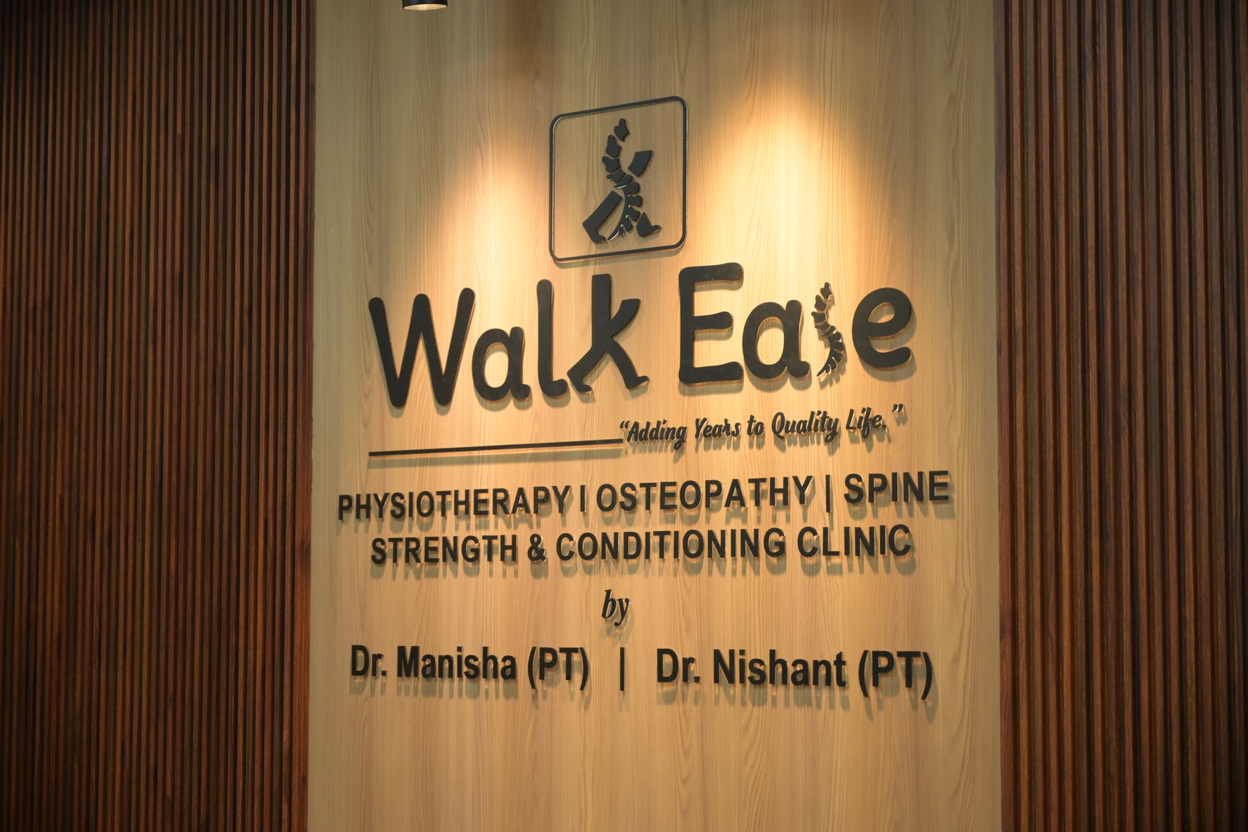 Walk Ease branded wall with founder names