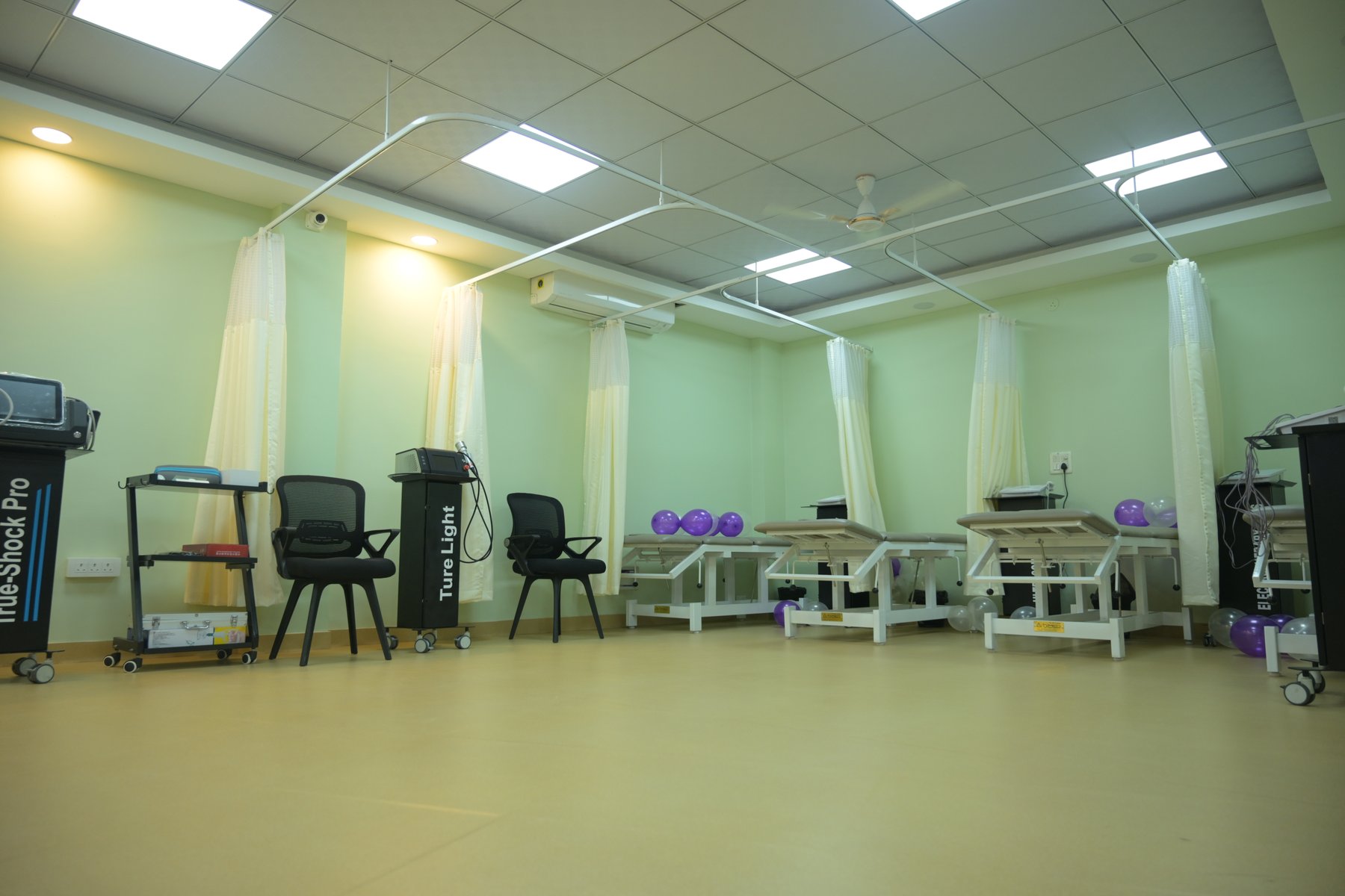 Treatment bays with therapy beds and electrotherapy equipment